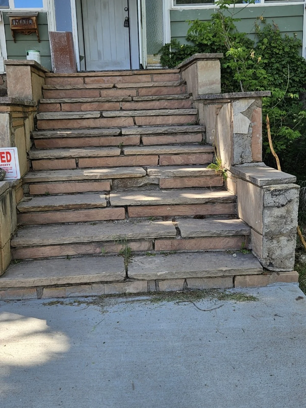Front stone steps before repair