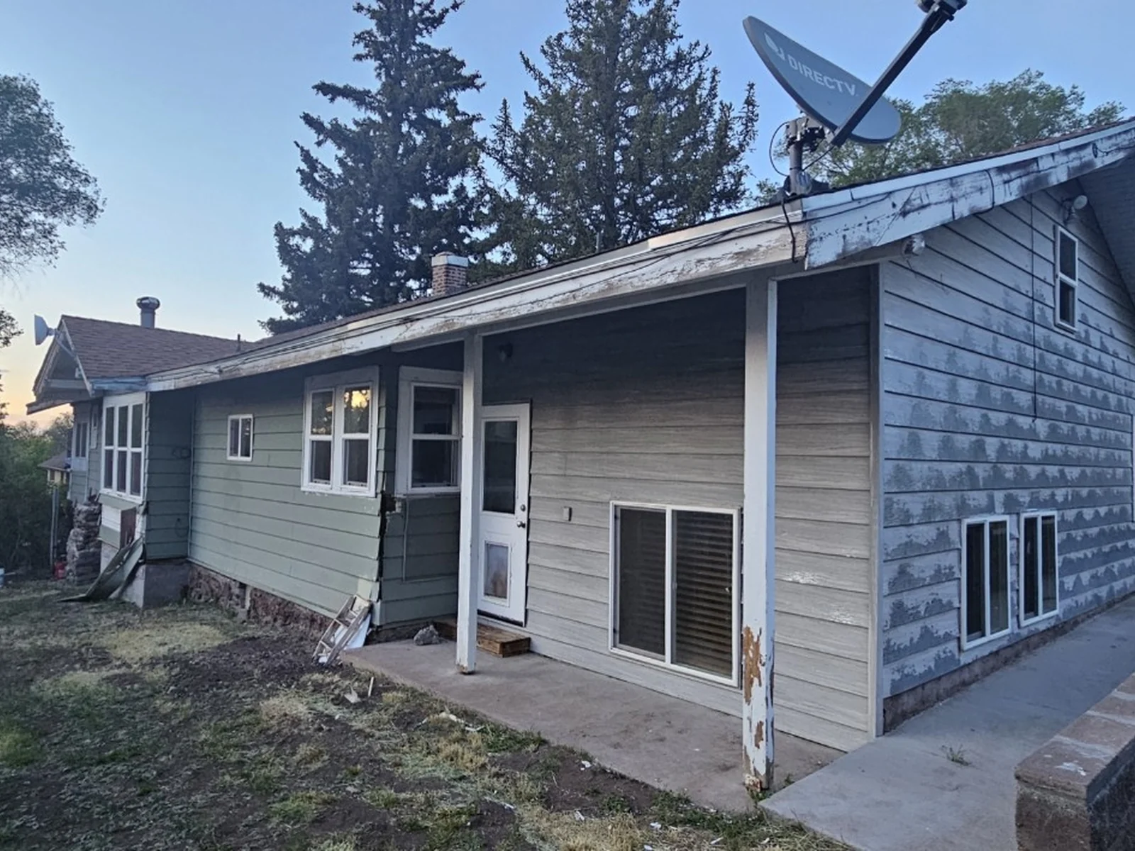 Side and rear exterior before repairs