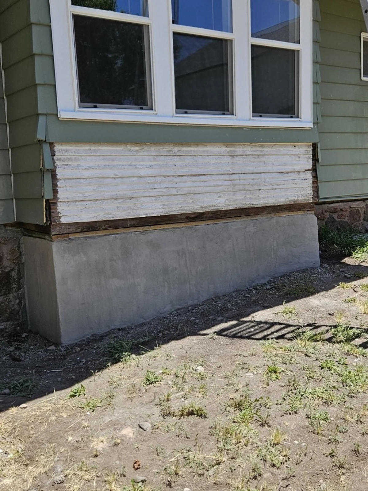Window and siding repair in progress